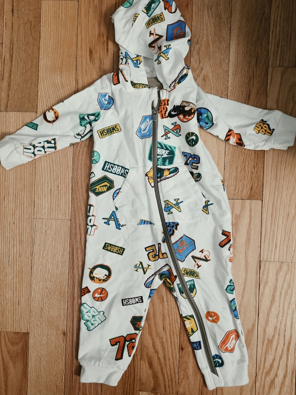 Nike White Hooded One-Piece with Multicolor Sports Badge Prints